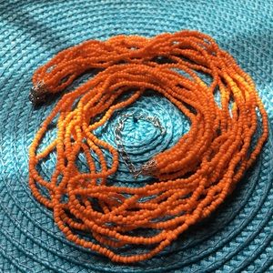 NWOT orange multi strand seed beads necklace